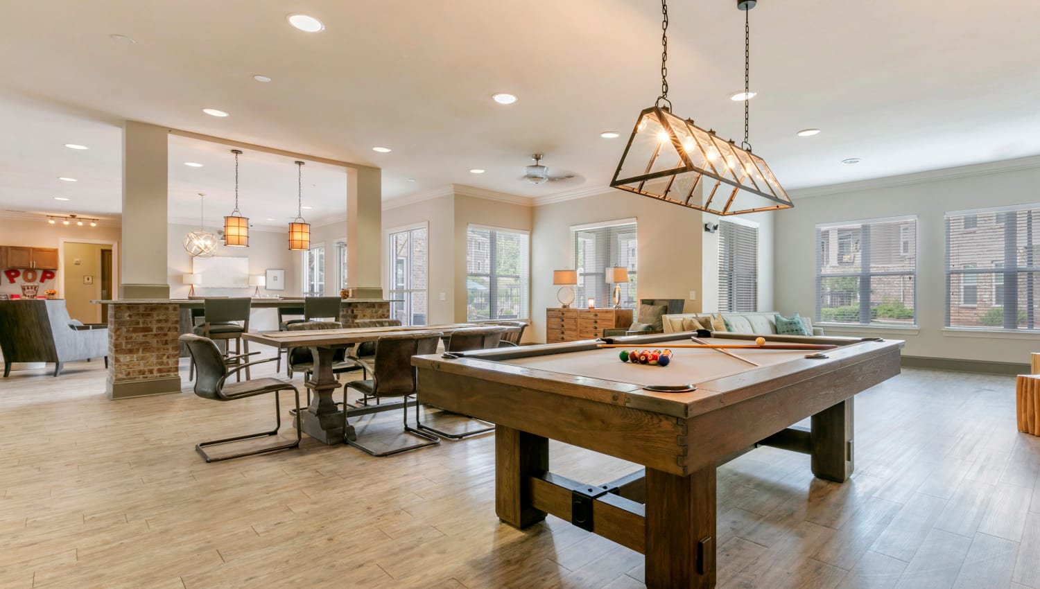 Game room with a billiards table at The Village at Apison Pike in Ooltewah, Tennessee