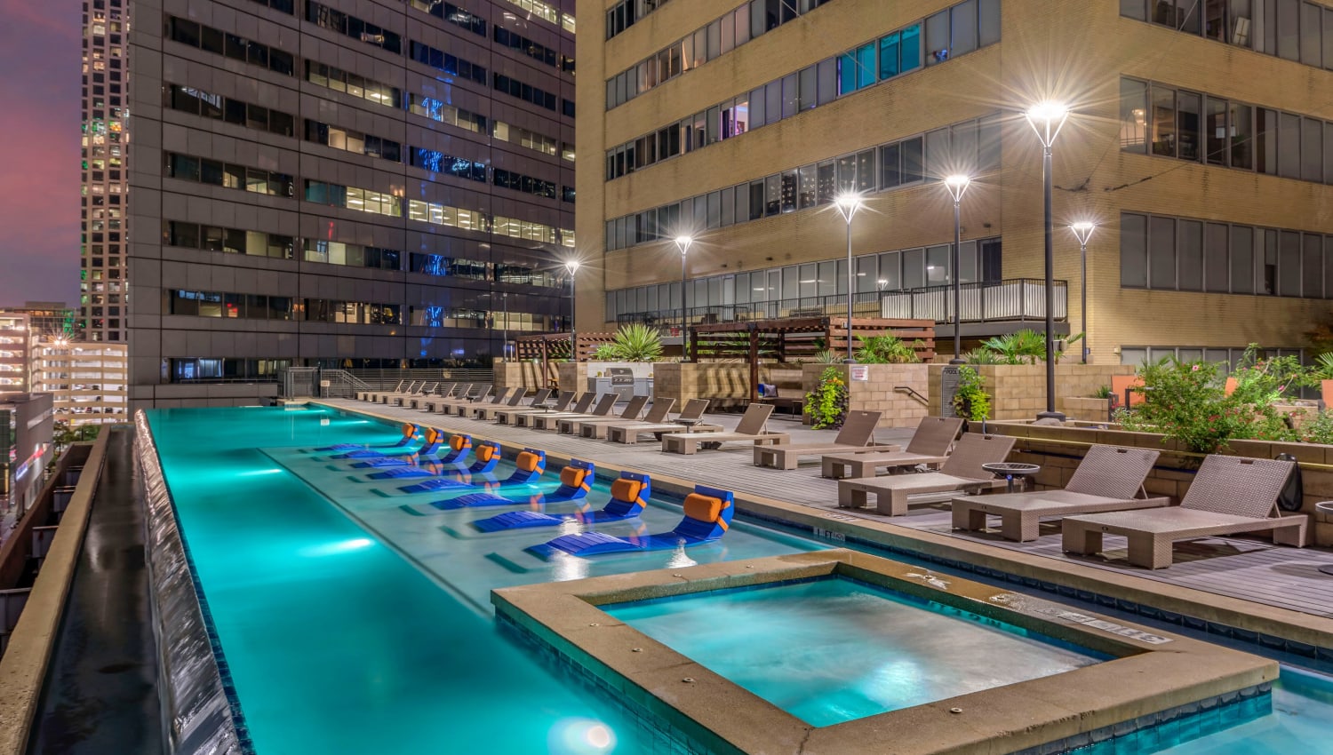 Rooftop infinity pool with hot tub at Mosaic Dallas in Dallas, Texas