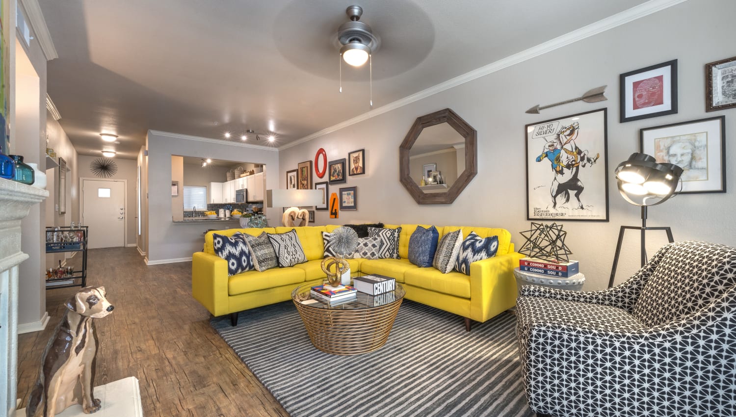 Beautifully decorated model living room in an open concept apartment home at 75 West in Dallas, Texas