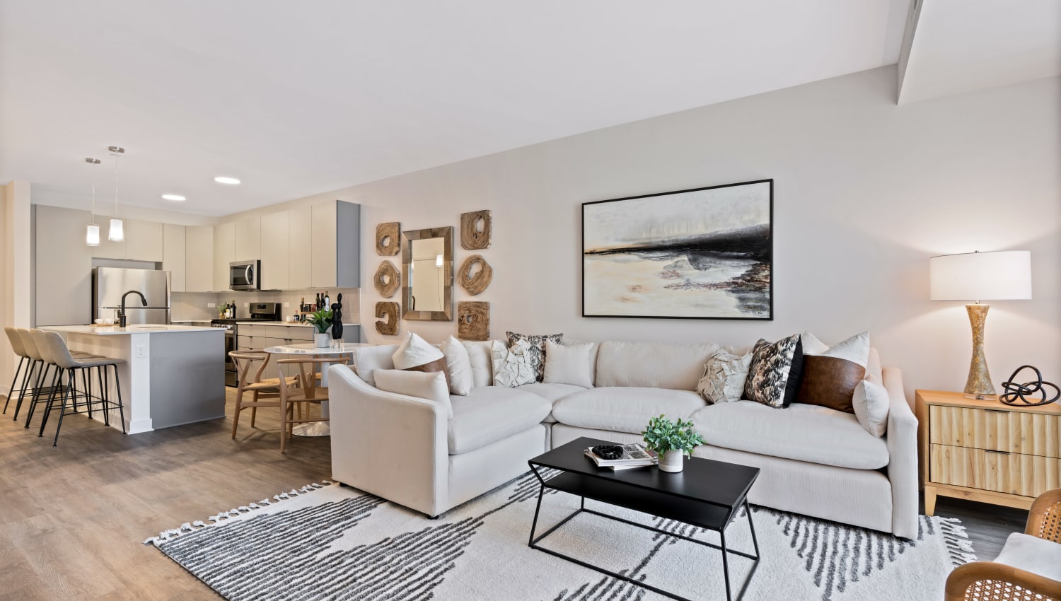 Open concept living room in model home at The Residences at Sawmill Station in Morton Grove, Illinois