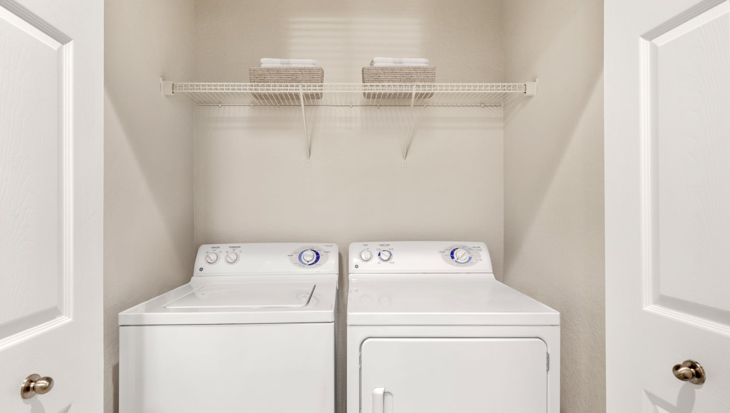 Simple laundry area  at Mirador & Stovall at River City in Jacksonville, Florida