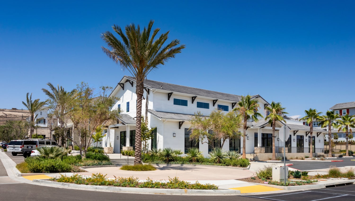 Exterior view from the street corner of The Residences at Escaya in Chula Vista, California