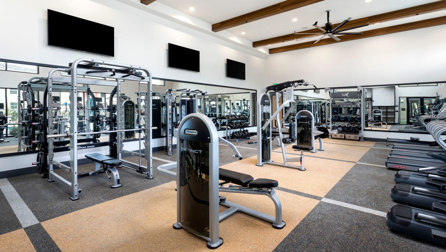 Fitness center with weight equipment at The Residences at Escaya in Chula Vista, California