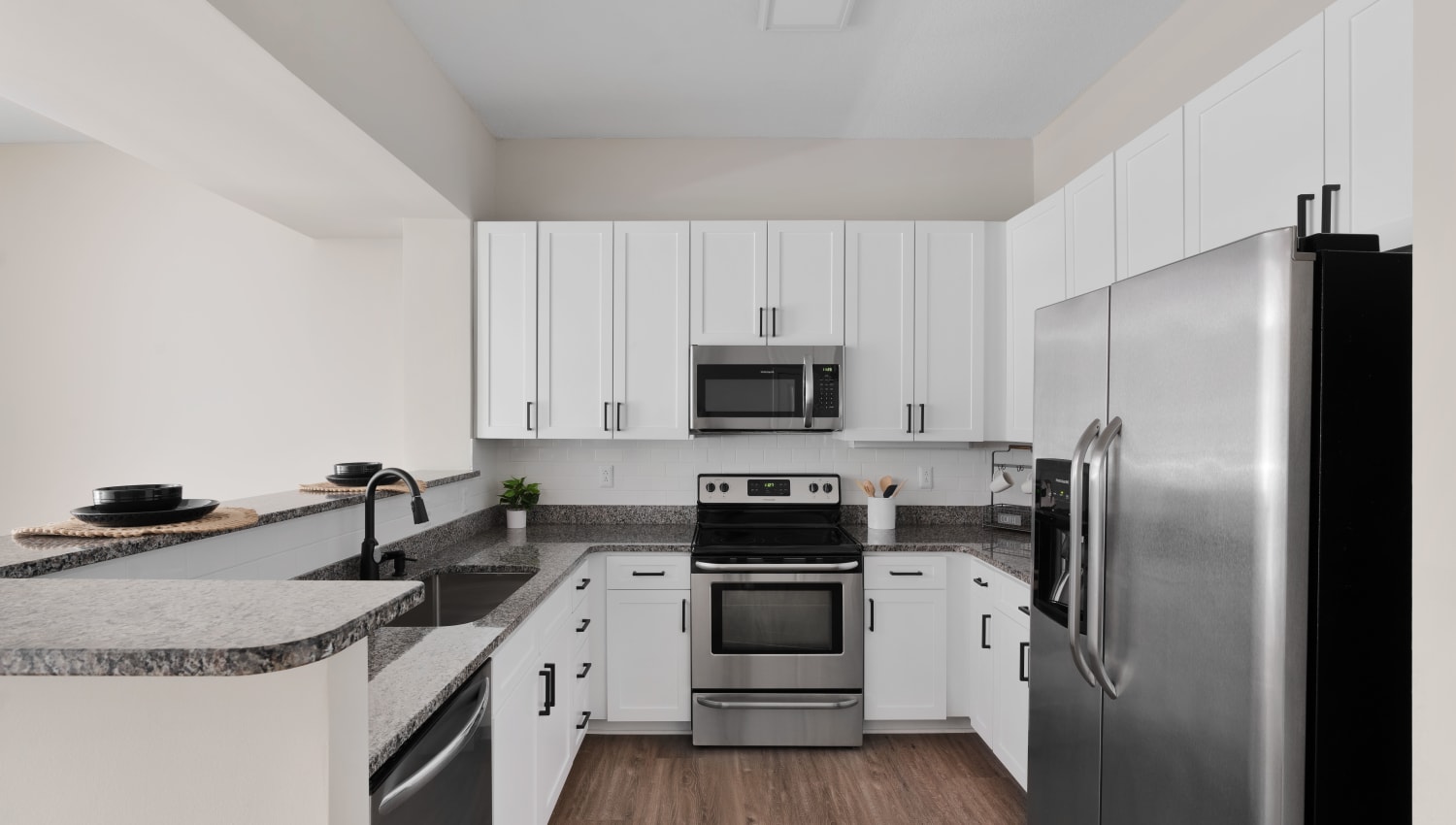 Model kitchen with stainless steel appliances at SouthPark Morrison