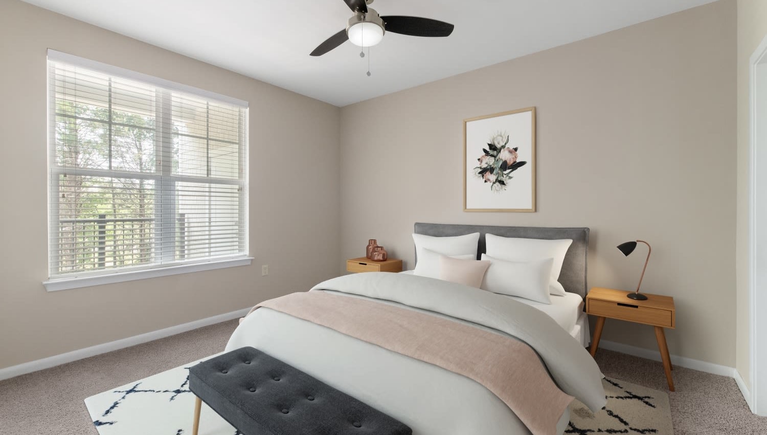 Model bedroom with ceiling fan at The Palmer in Charlotte, North Carolina