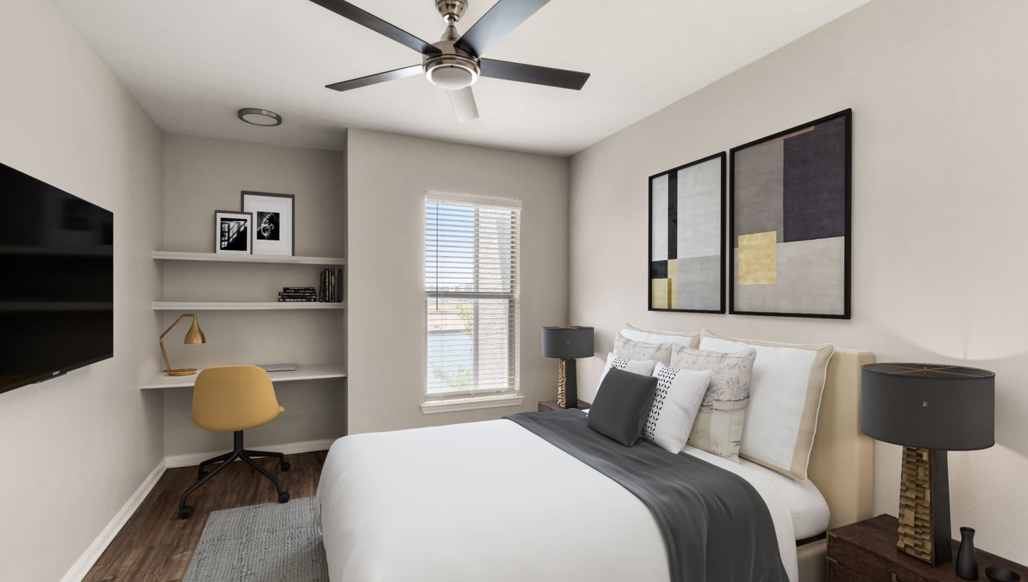 Well decorated model bedroom with office nook at Olympus Las Colinas in Irving, Texas
