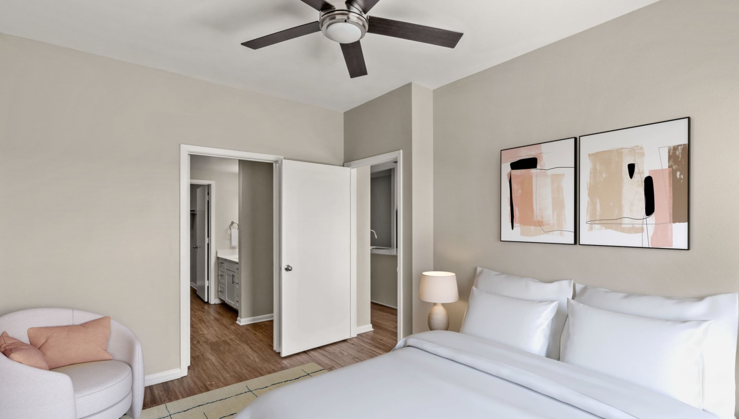 Main bedroom with attached bathroom at Olympus Boulevard in Frisco, Texas