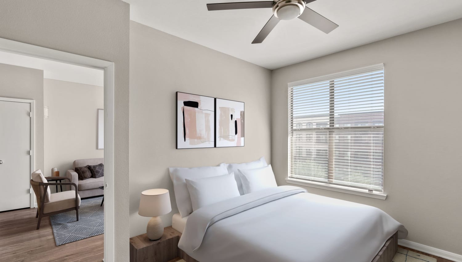 Well decorated and brightly lit model bedroom at Olympus Boulevard in Frisco, Texas