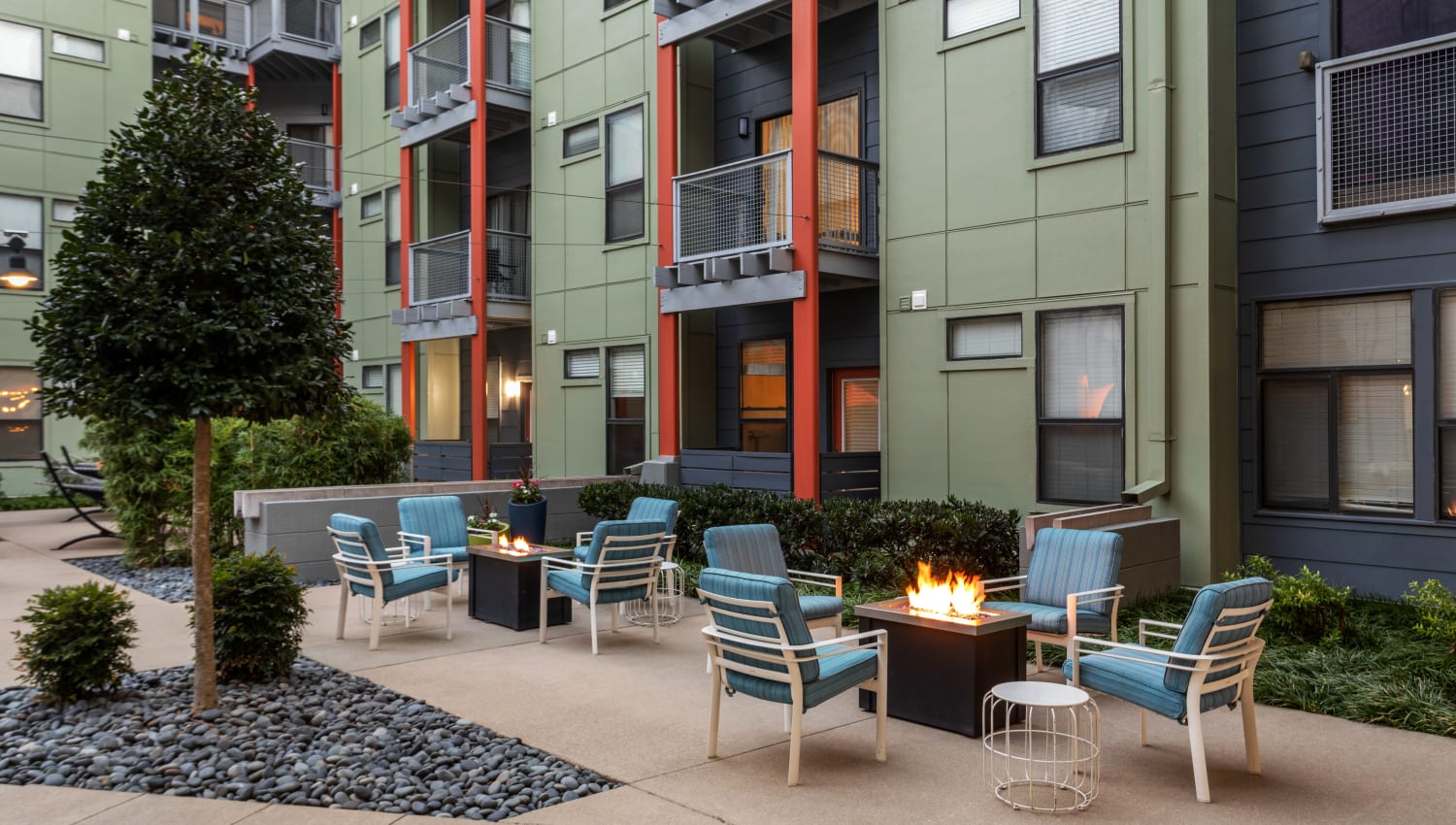 Outdoor fire pits and comfortable seating area at Olympus Midtown in Nashville, Tennessee