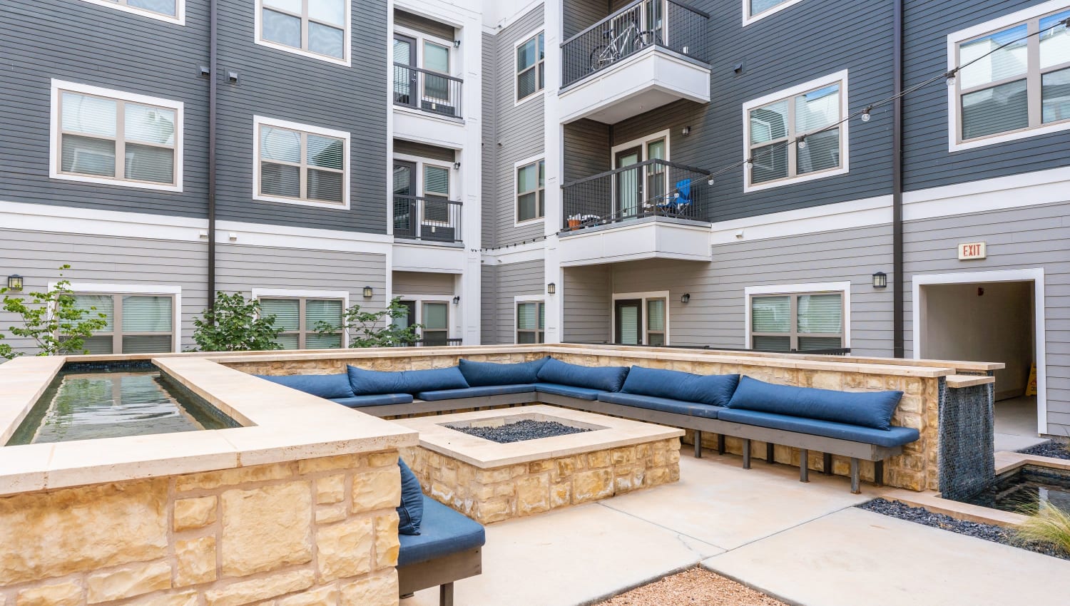 Another view of the exterior firepit at The Everett at Ally Village in Midland, Texas