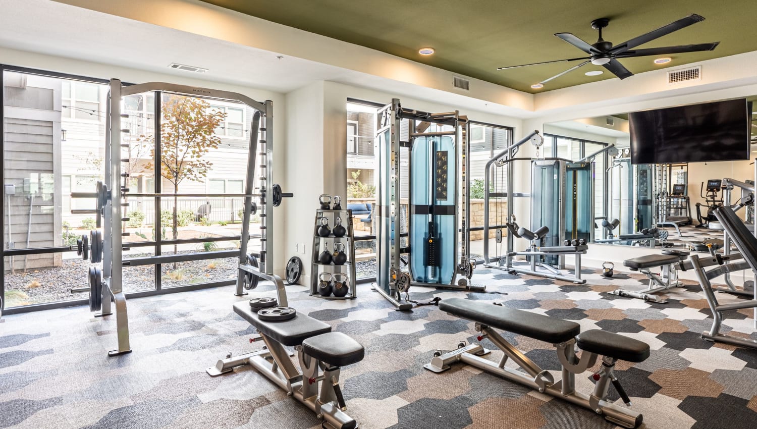 Fitness area with benches at The Everett at Ally Village in Midland, Texas