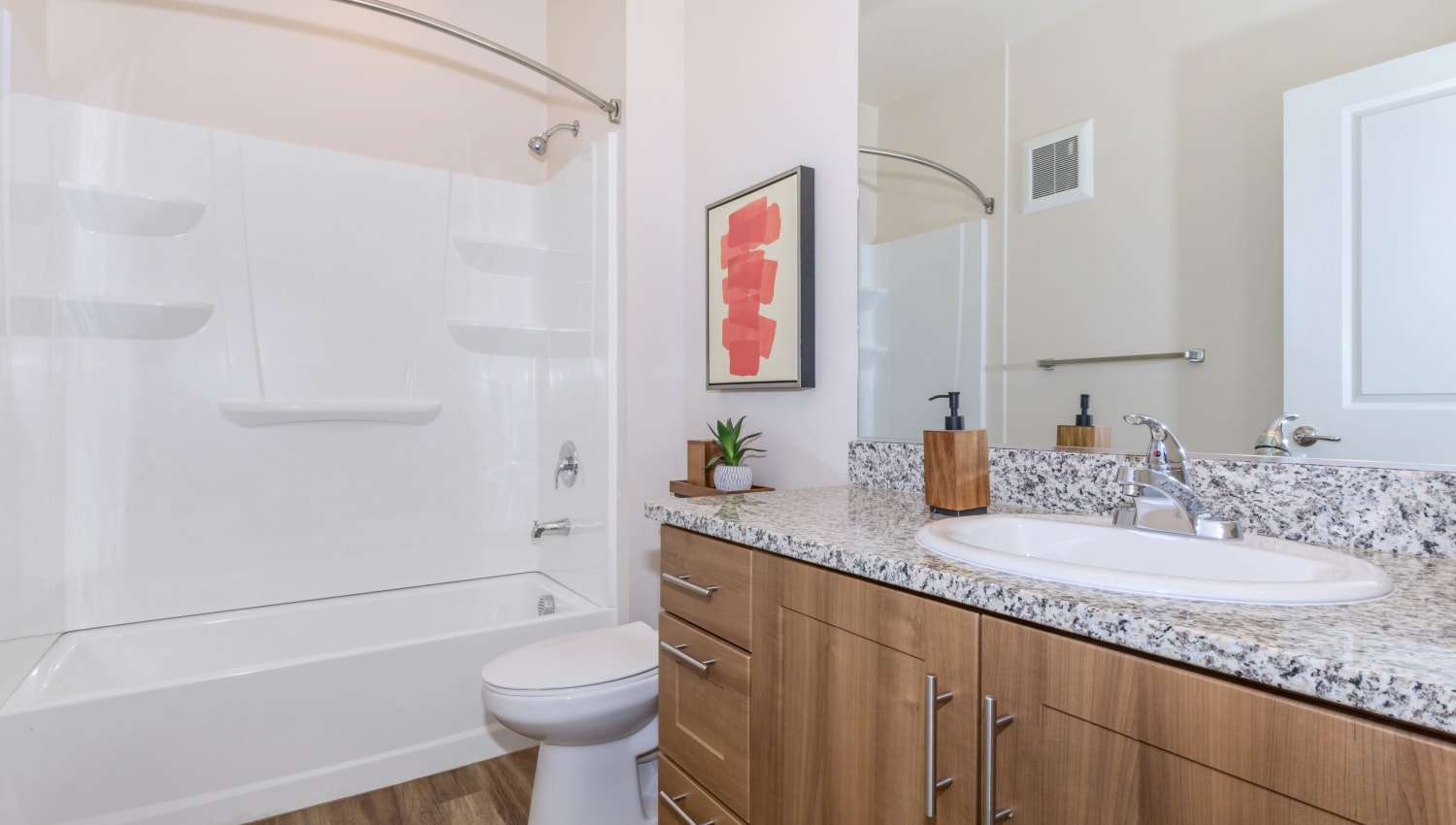 Bathroom with granite countertops at Trailside Apartments in Flagstaff, Arizona