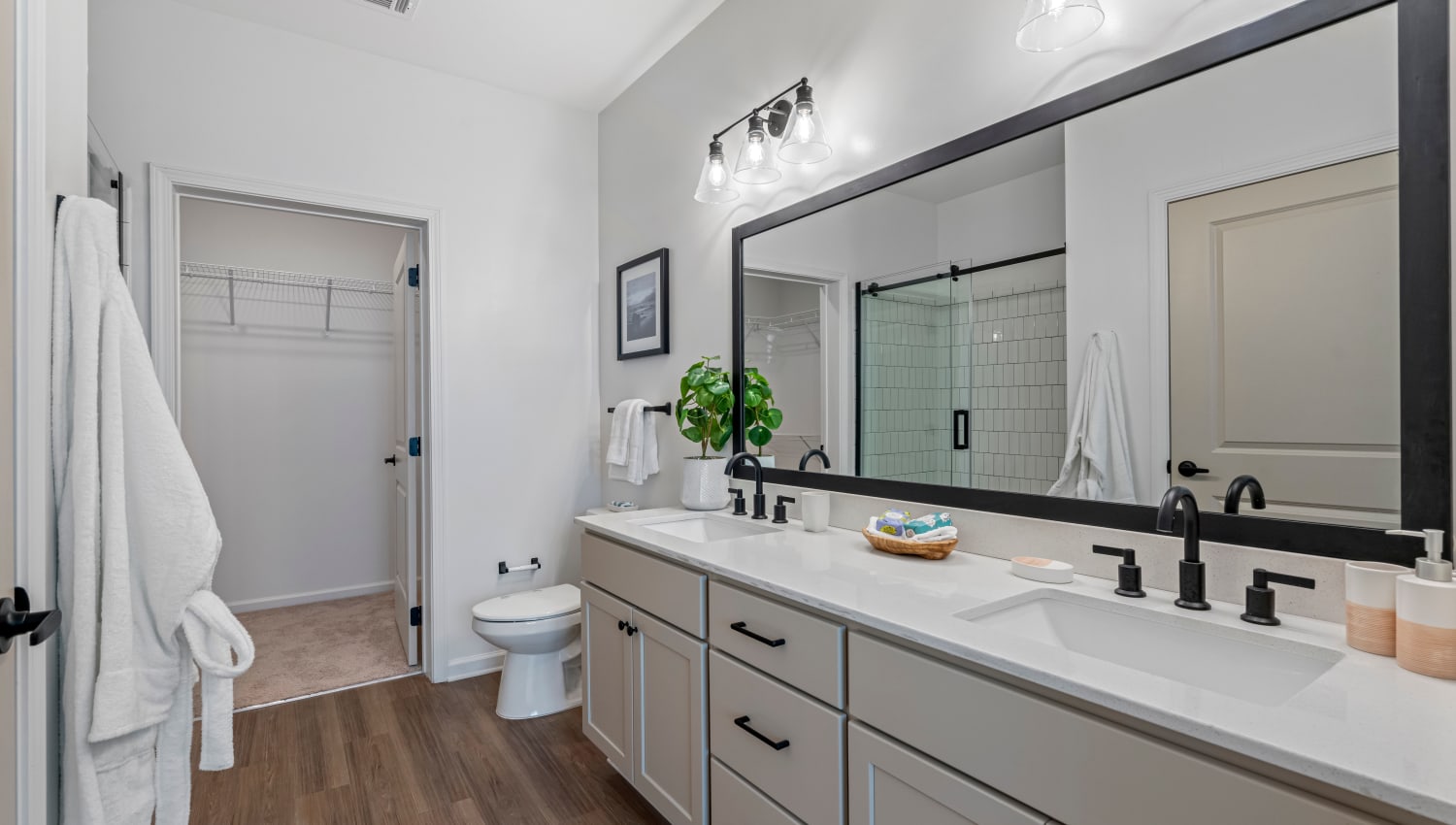 Bathroom with dual sinks at Primrose at Santa Rosa Beach in Santa Rosa Beach, Florida