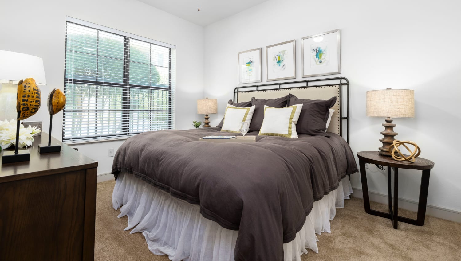 Modern and clean bedroom at Olympus at Memorial in Houston, Texas