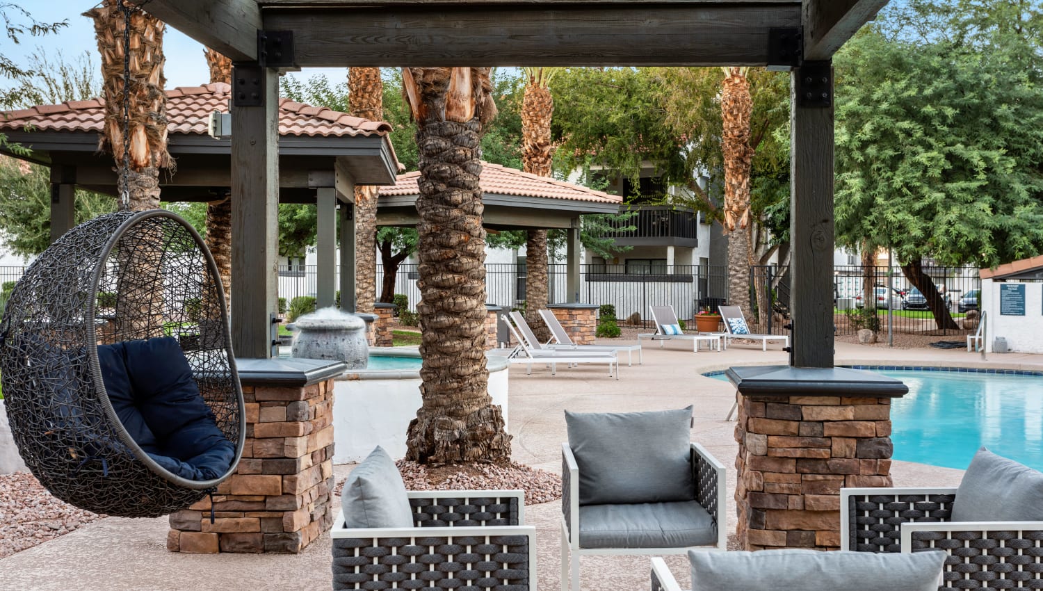 Outdoor lounge by the pool at Cielo on Gilbert in Mesa, Arizona