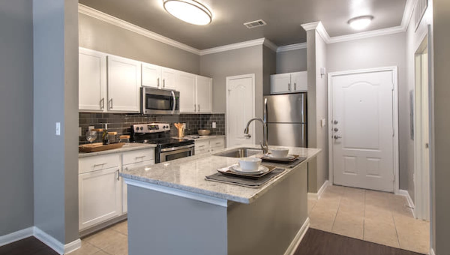 Kitchen with appliances  at Olympus Las Colinas