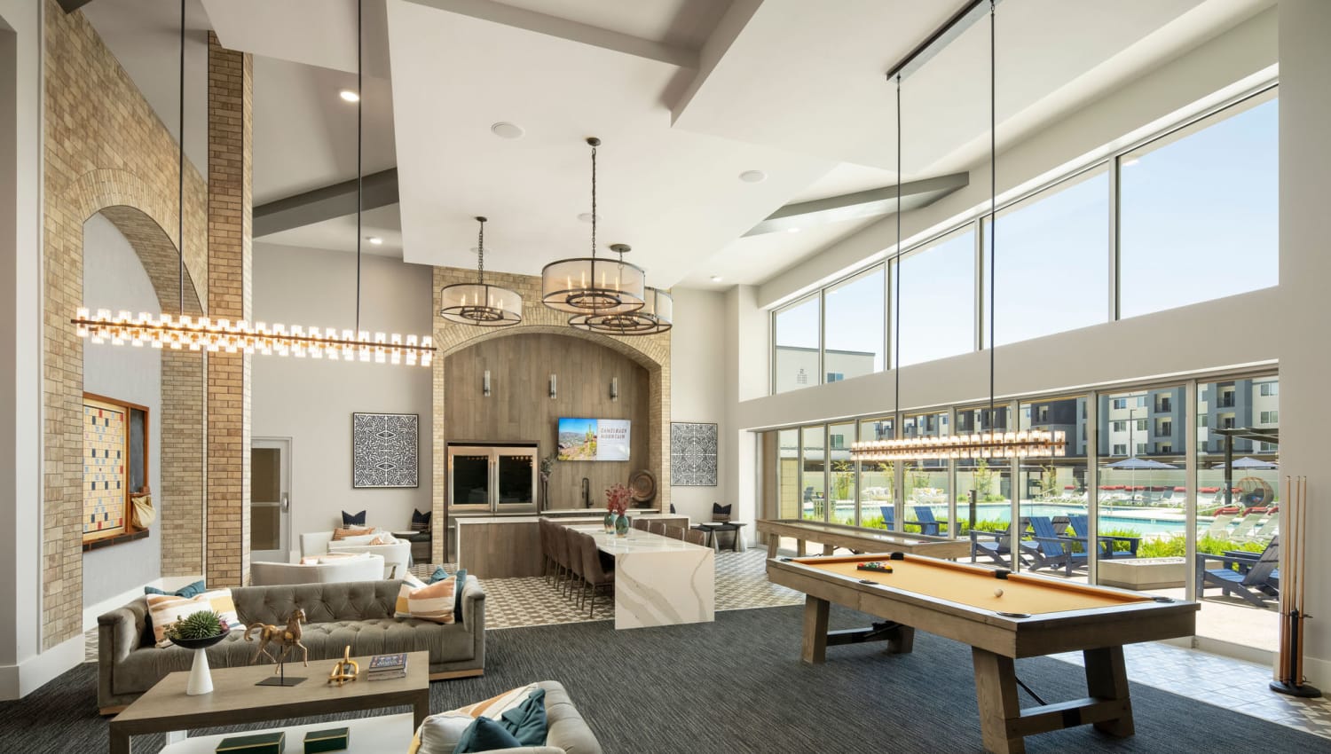 Game room in the luxury resident clubhouse at Olympus Chandler at the Park in Chandler, Arizona