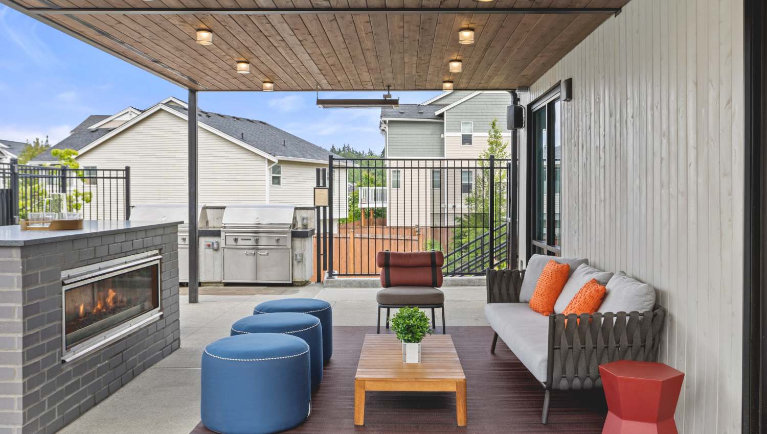 Outdoor seating and fireplace at Helm in Everett, Washington