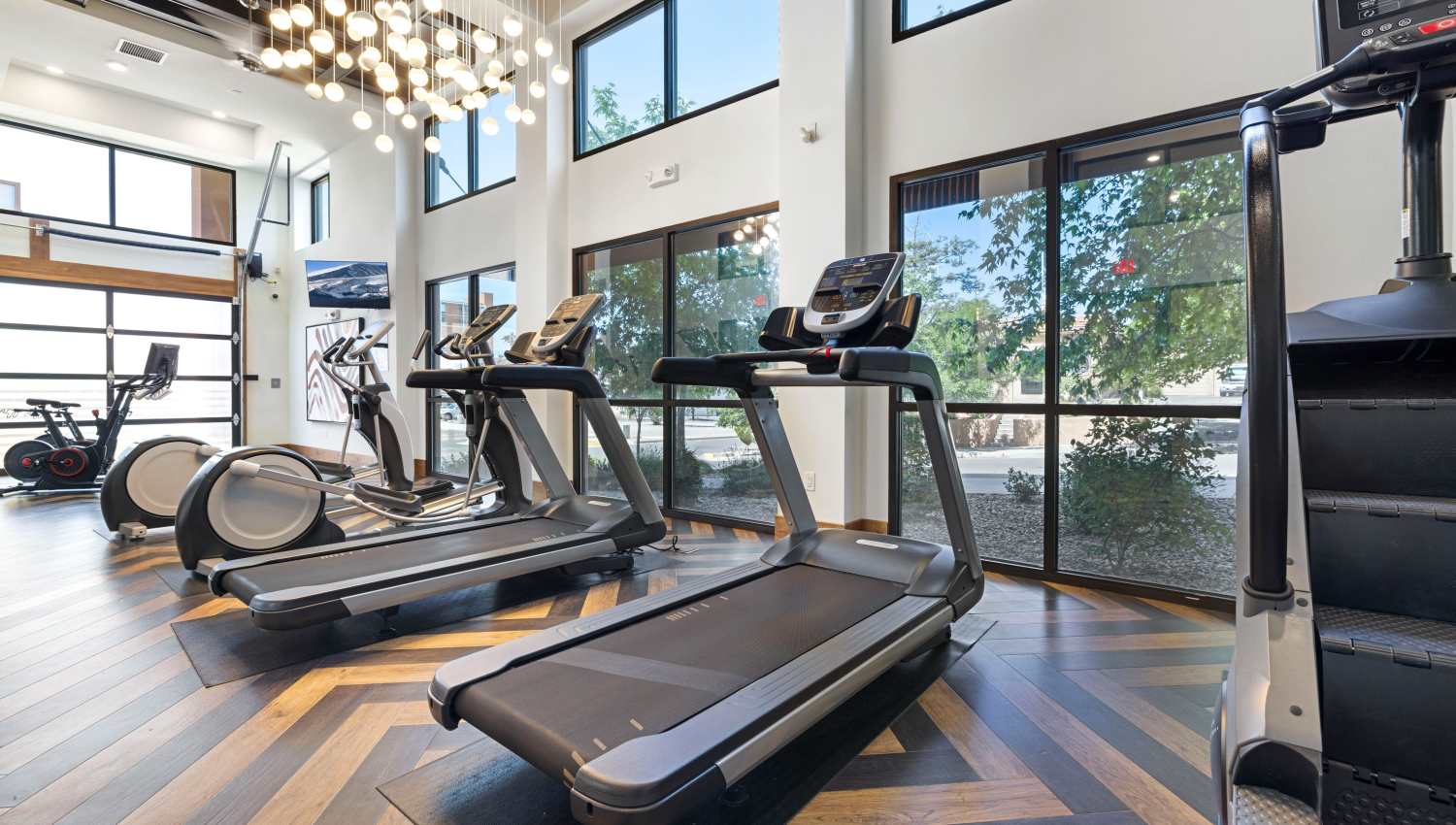 A room with treadmills and exercise equipment at Olympus Highlands North in Albuquerque, New Mexico