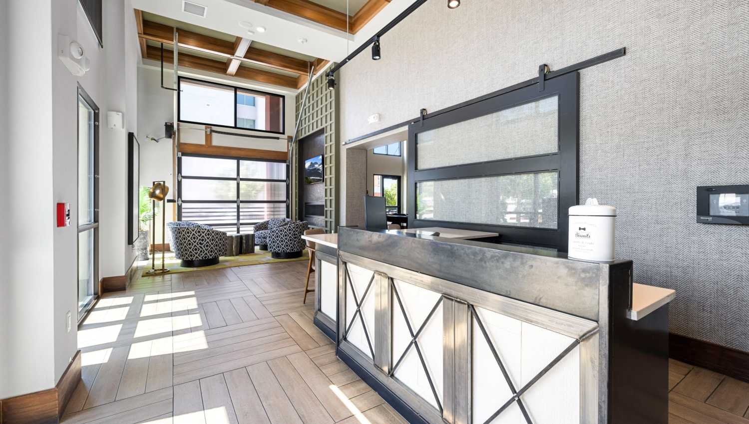 A reception desk in a room at Olympus Highlands North in Albuquerque, New Mexico