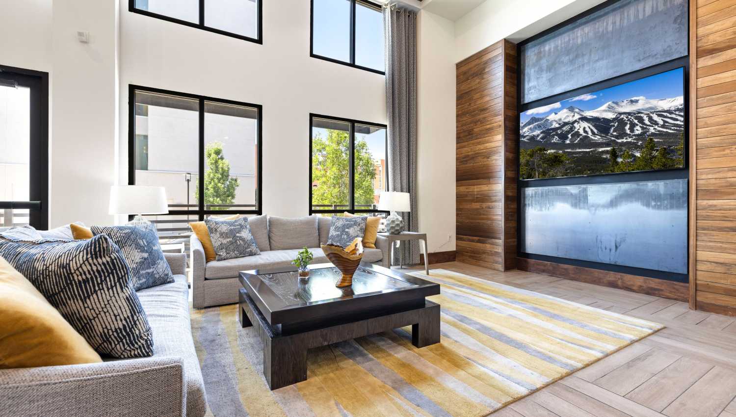 Clubhouse living room with a couch and a coffee table at Olympus Highlands North in Albuquerque, New Mexico