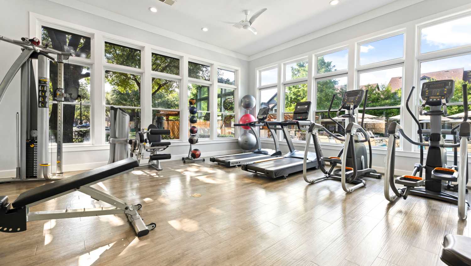 Fitness center with exercise equipment at Olympus Town Center in Keller, Texas