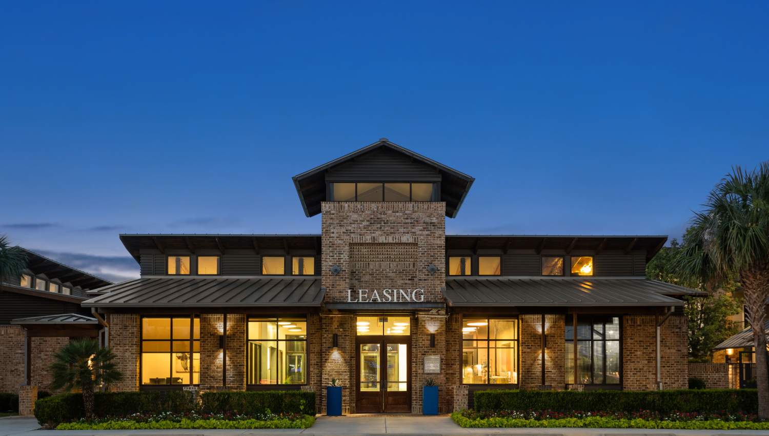 A Leasing building with a parking lot at Tacara at Westover Hills in San Antonio, Texas