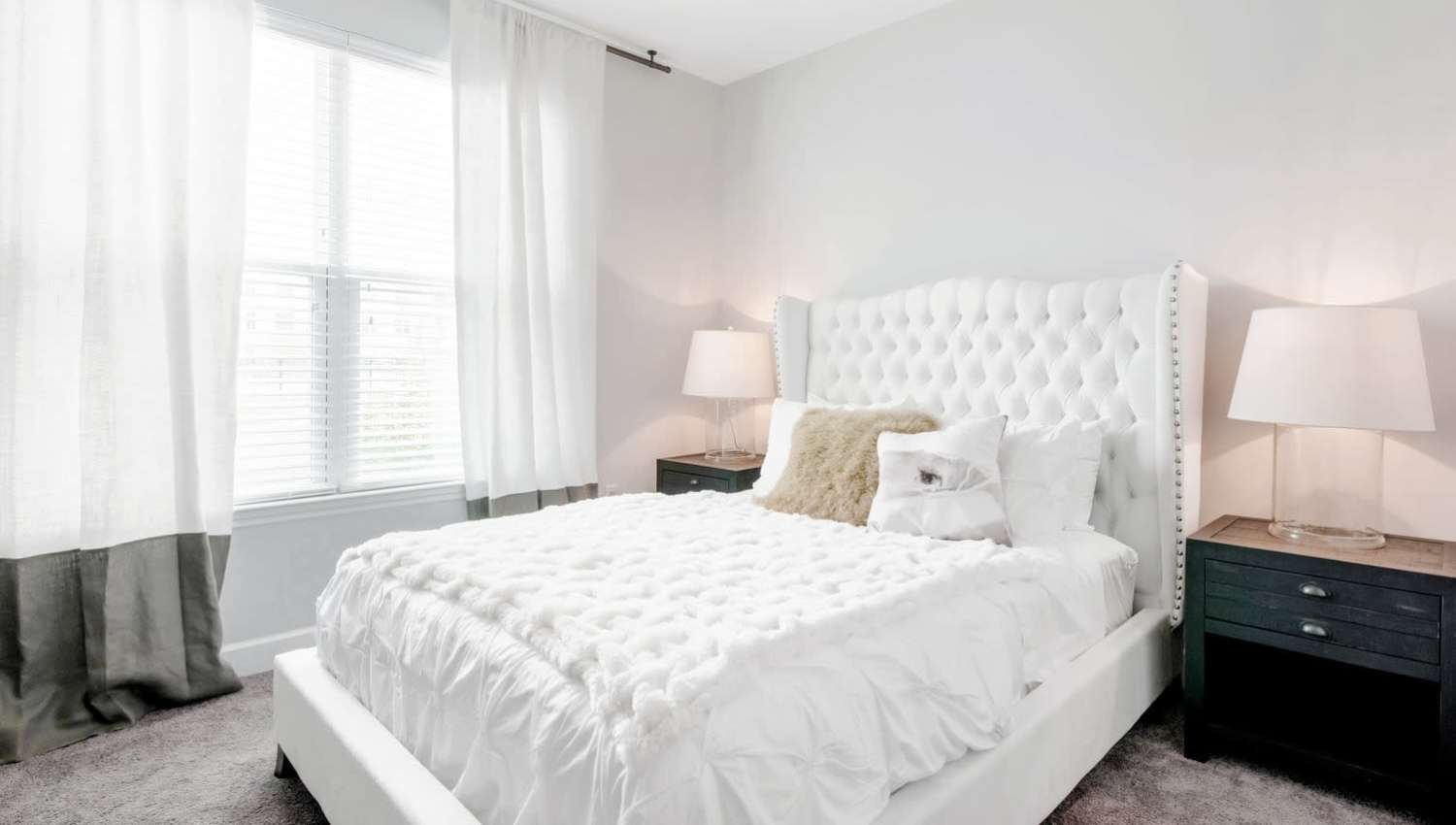White themed bedroom at Olympus Preserve at Town Center in Jacksonville, Florida