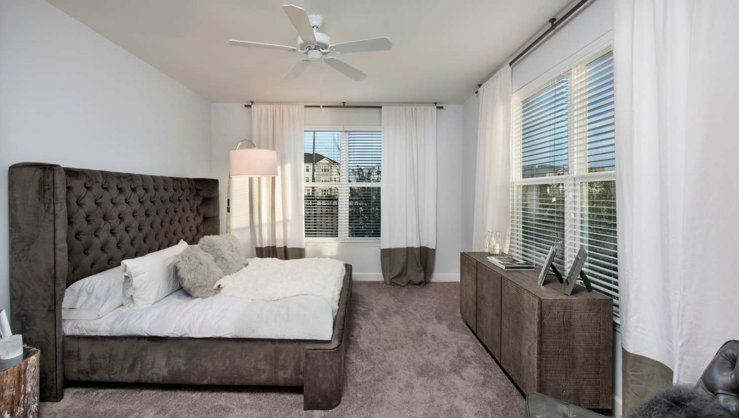 Bedroom with large window at Olympus Preserve at Town Center in Jacksonville, Florida