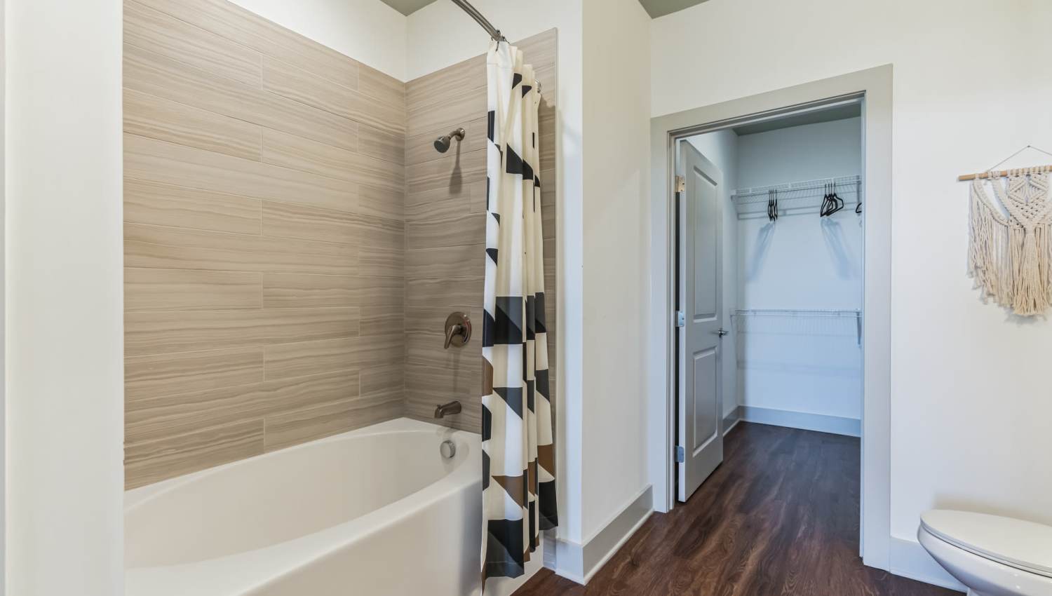 Bright bathroom with shower and tub at The Griff in Nashville, Tennessee,  