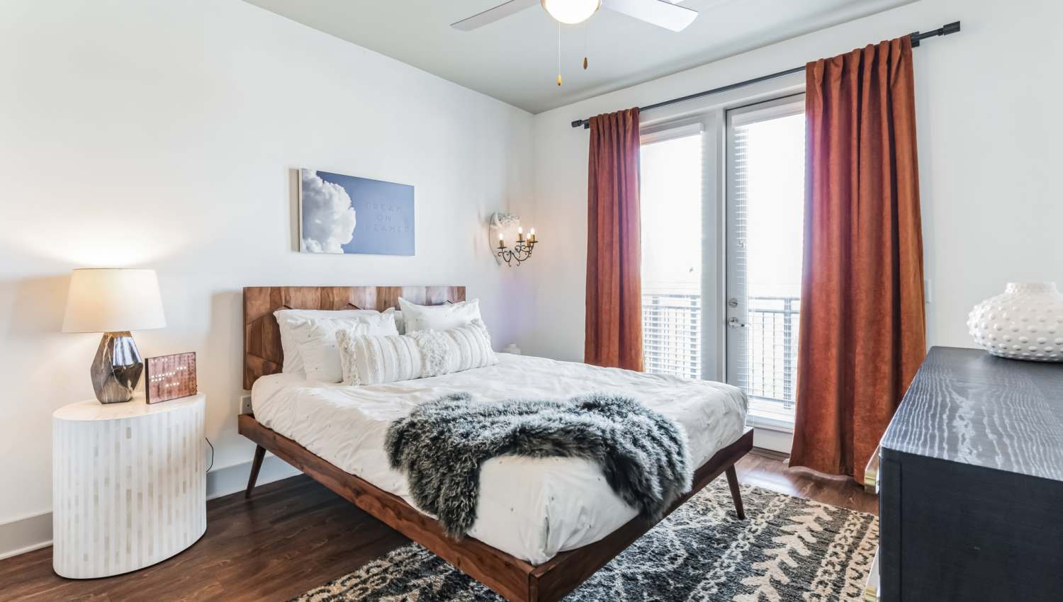 Bright bedroom with luxurious bed and large window at The Griff in Nashville, Tennessee, 