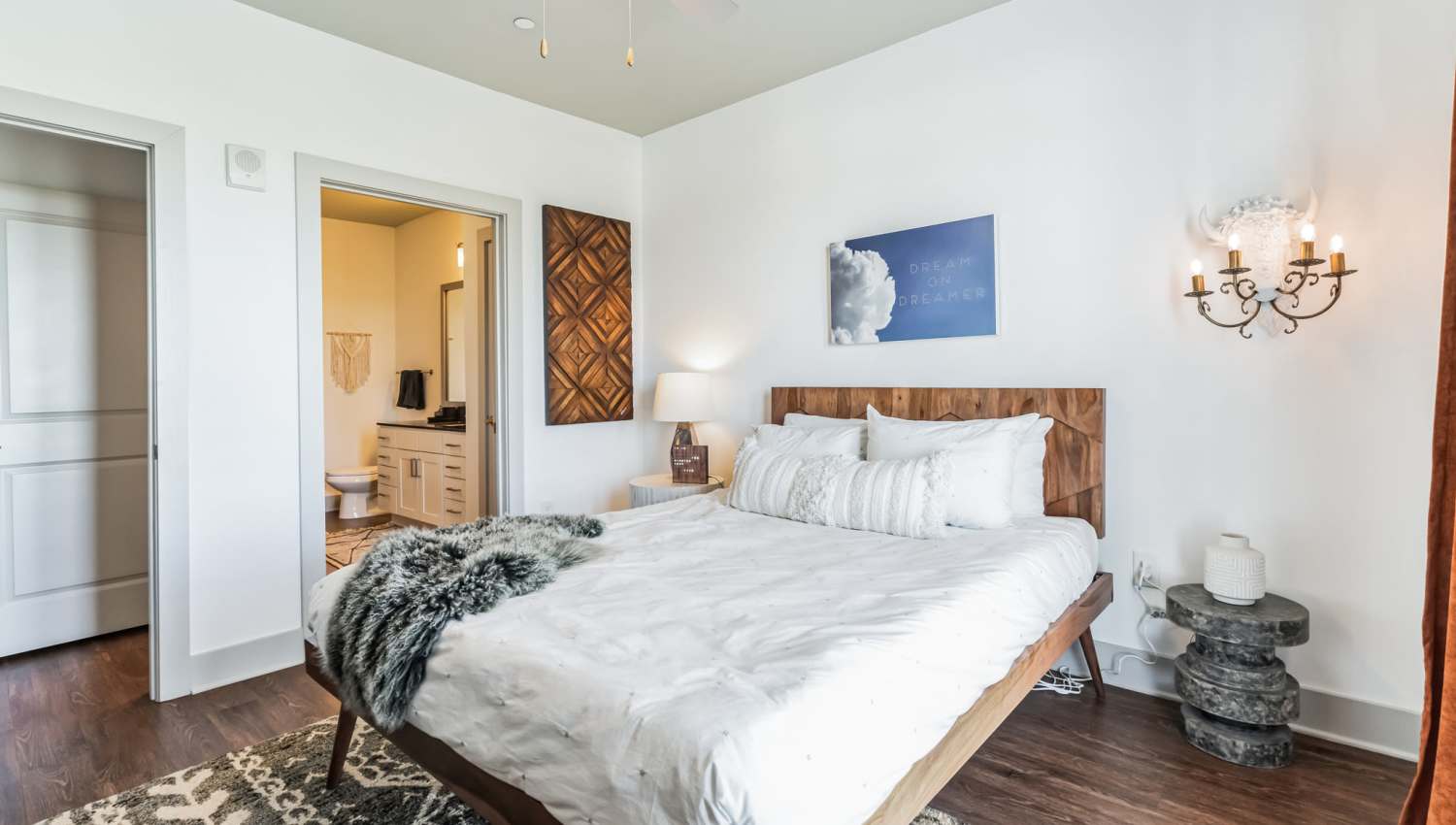 Spacious bedroom with large bed and attached bathroom at The Griff in Nashville, Tennessee,  