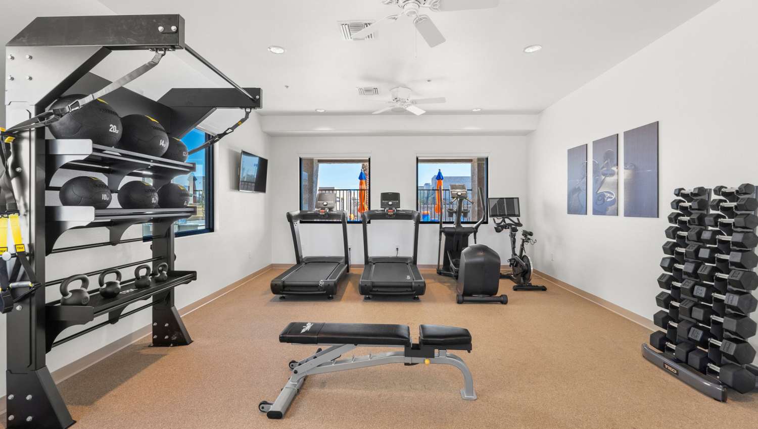 Fitness center with ceiling fan at Olympus at Arroyo Verde in Tucson, Arizona