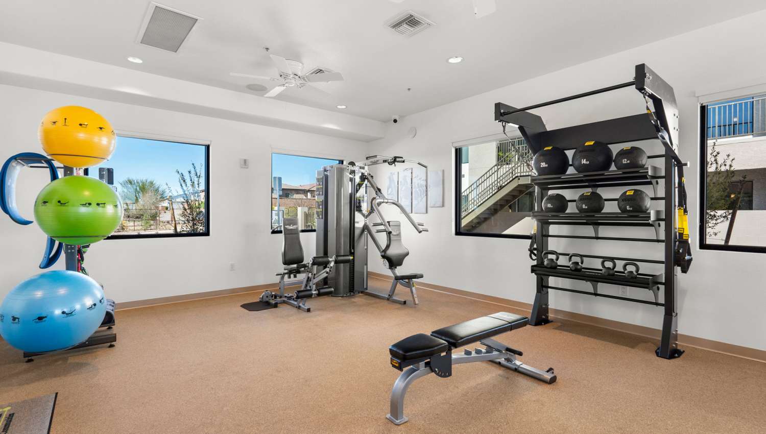 Fitness center with two windows at Olympus at Arroyo Verde in Tucson, Arizona