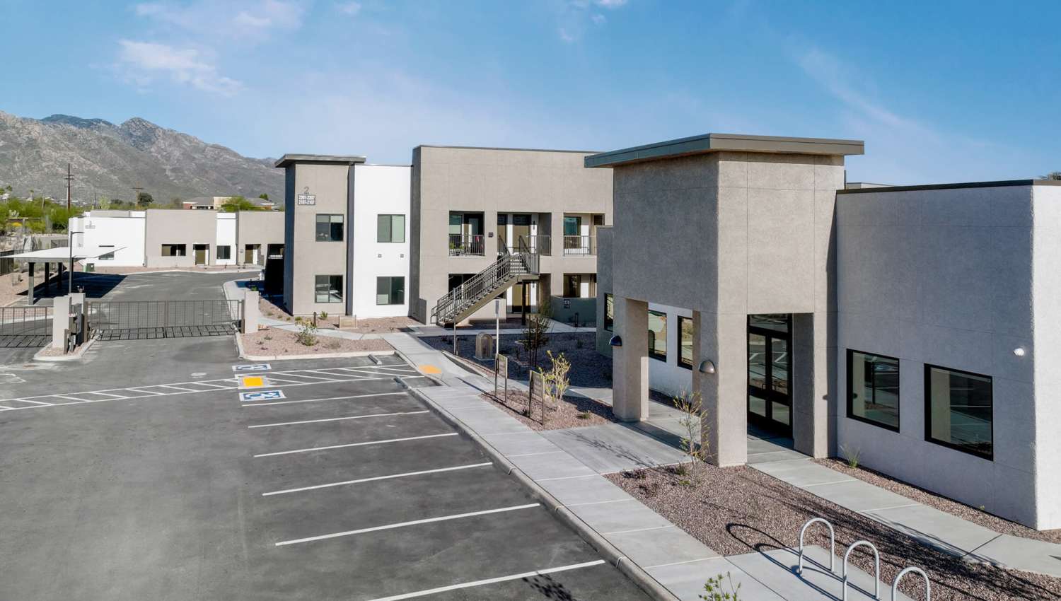 Community with parking lot at Olympus at Arroyo Verde in Tucson, Arizona
