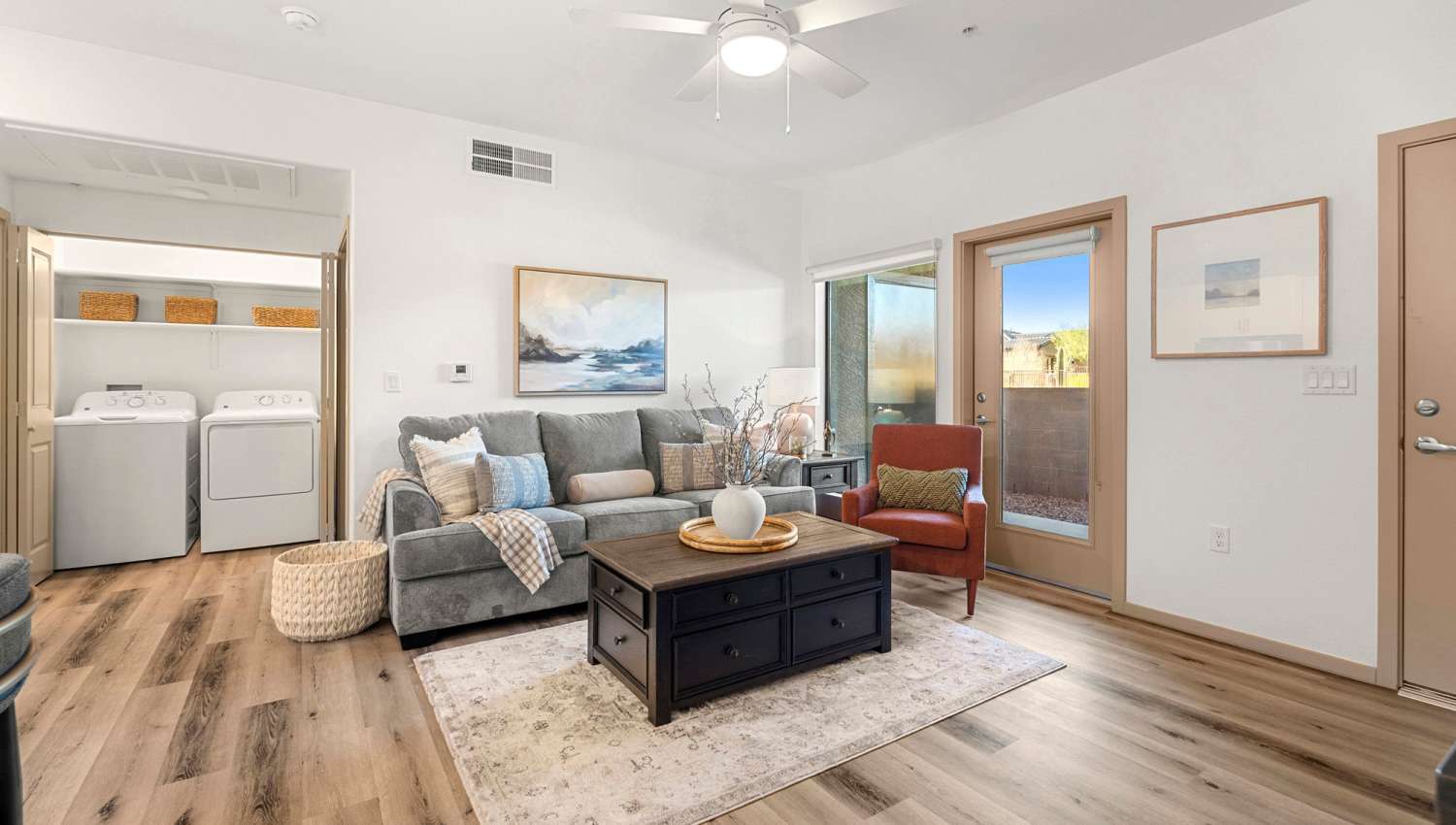 Living room with attached patio at Olympus at Arroyo Verde in Tucson, Arizona