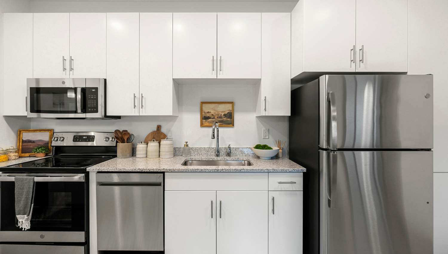 Kitchen with granite countertop at Olympus at Arroyo Verde in Tucson, Arizona