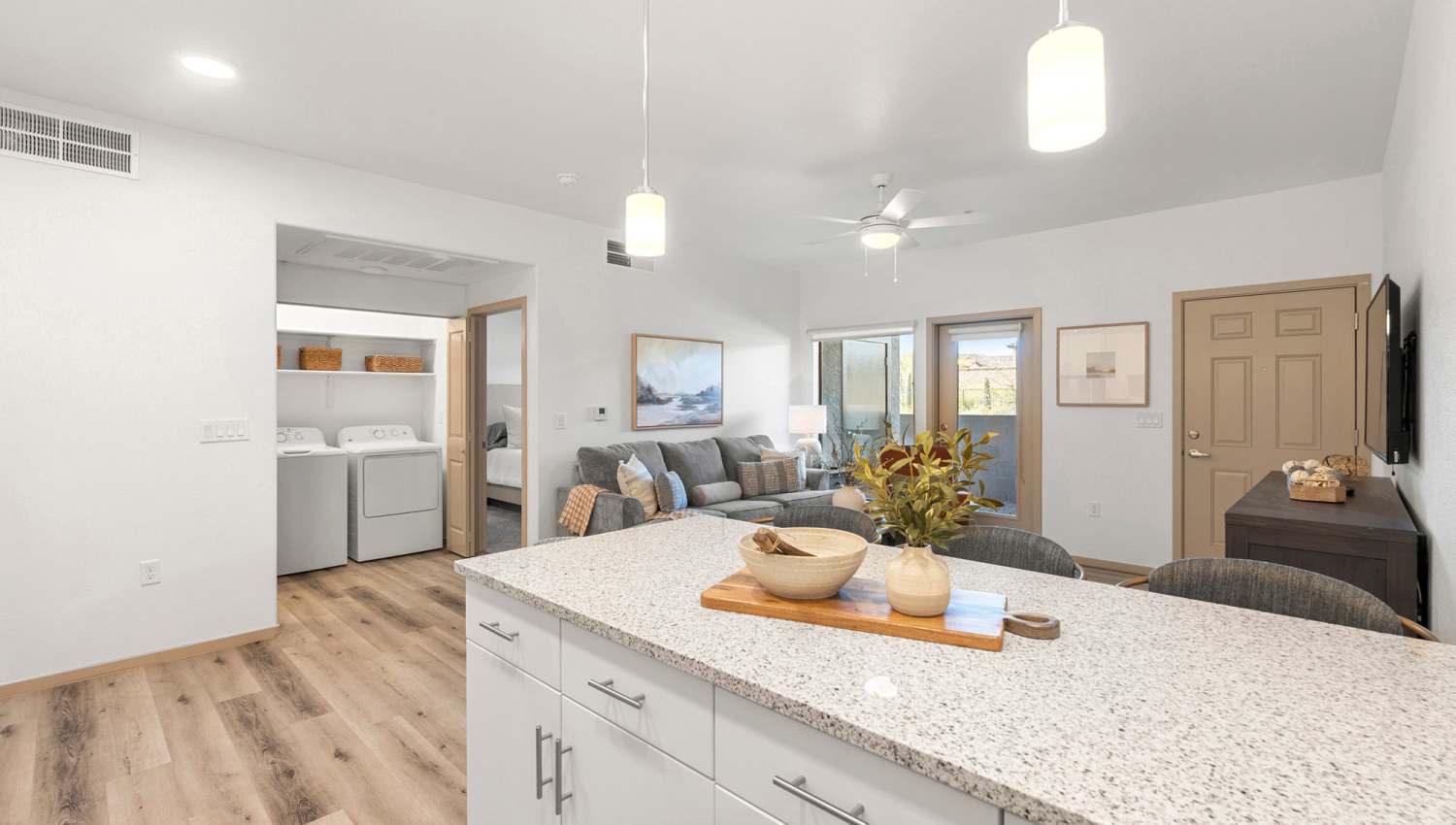 Kitchen with view living area at Olympus at Arroyo Verde in Tucson, Arizona 