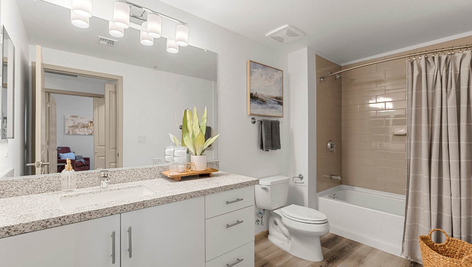 Bathroom with wooden flooring at Olympus at Arroyo Verde in Tucson, Arizona