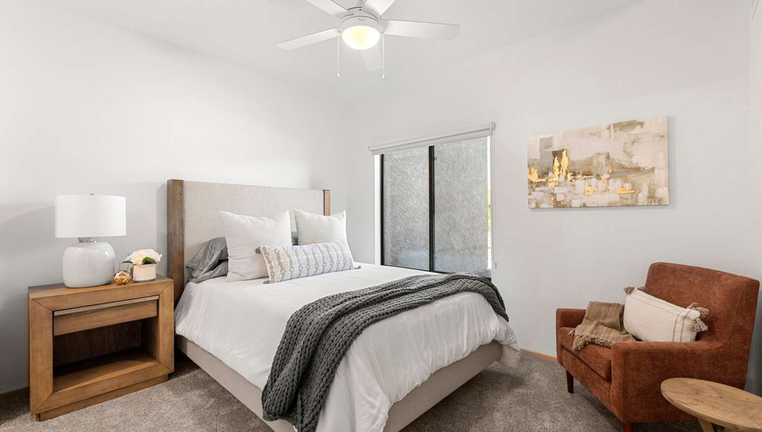 Bedroom with a chair at Olympus at Arroyo Verde in Tucson, Arizona