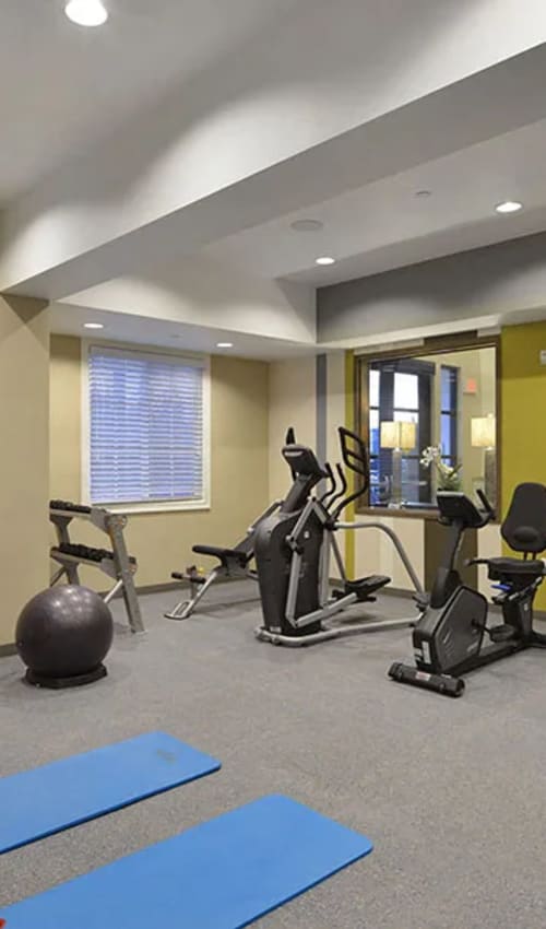 Community fitness center at Olivera Senior Apartments in Pomona, California