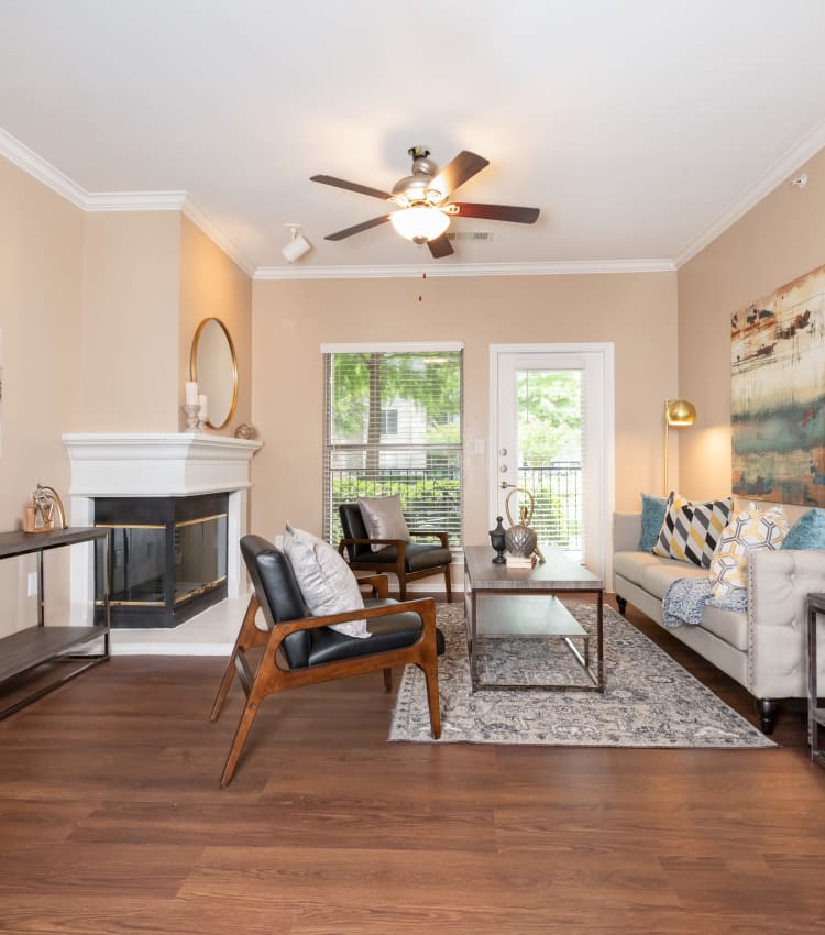 Model living room at The Springs of Indian Creek in Carrollton, Texas