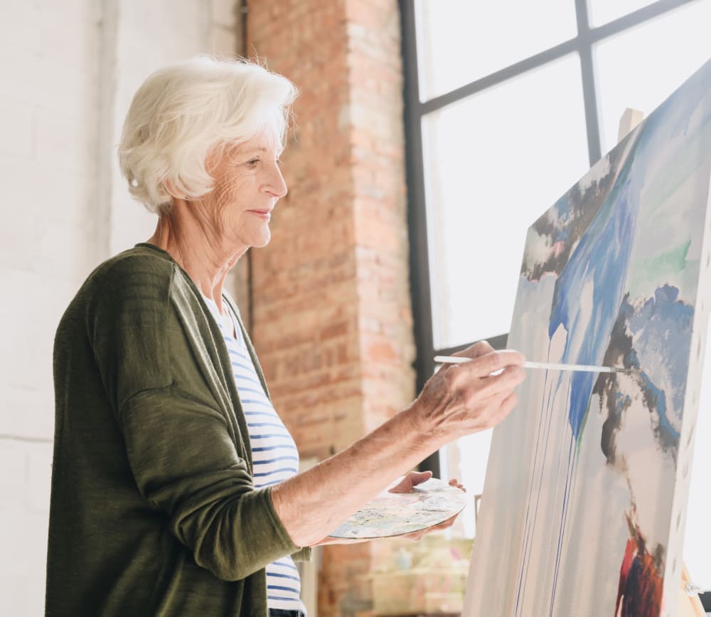 Resident painting at Clearwater Agritopia in Gilbert, Arizona