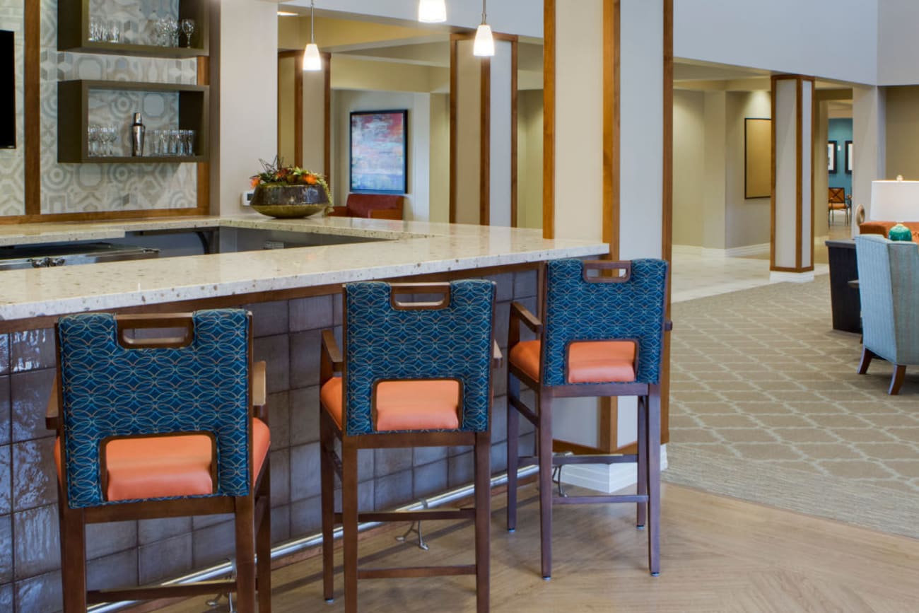 Bar seating in the resident clubhouse at Savanna House in Gilbert, Arizona