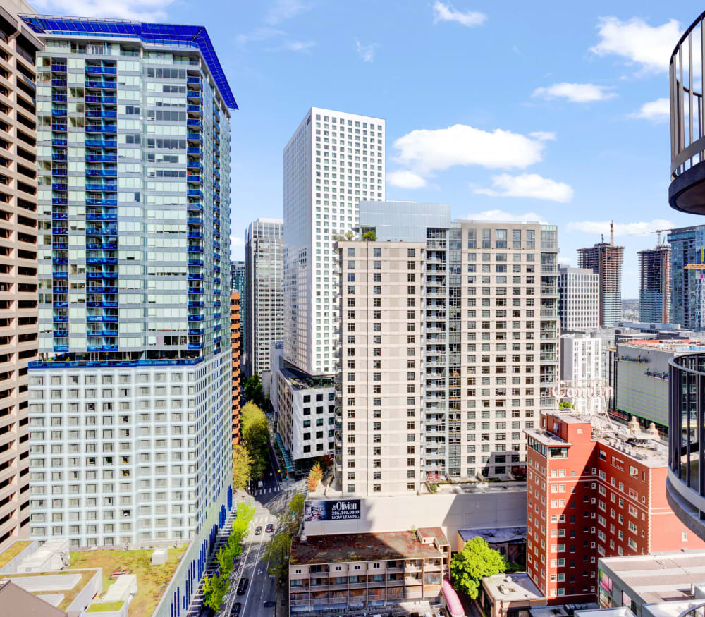 Exterior view of our community with a Caffe Ladro at the ground-floor retail area at Tower 801 in Seattle, Washington