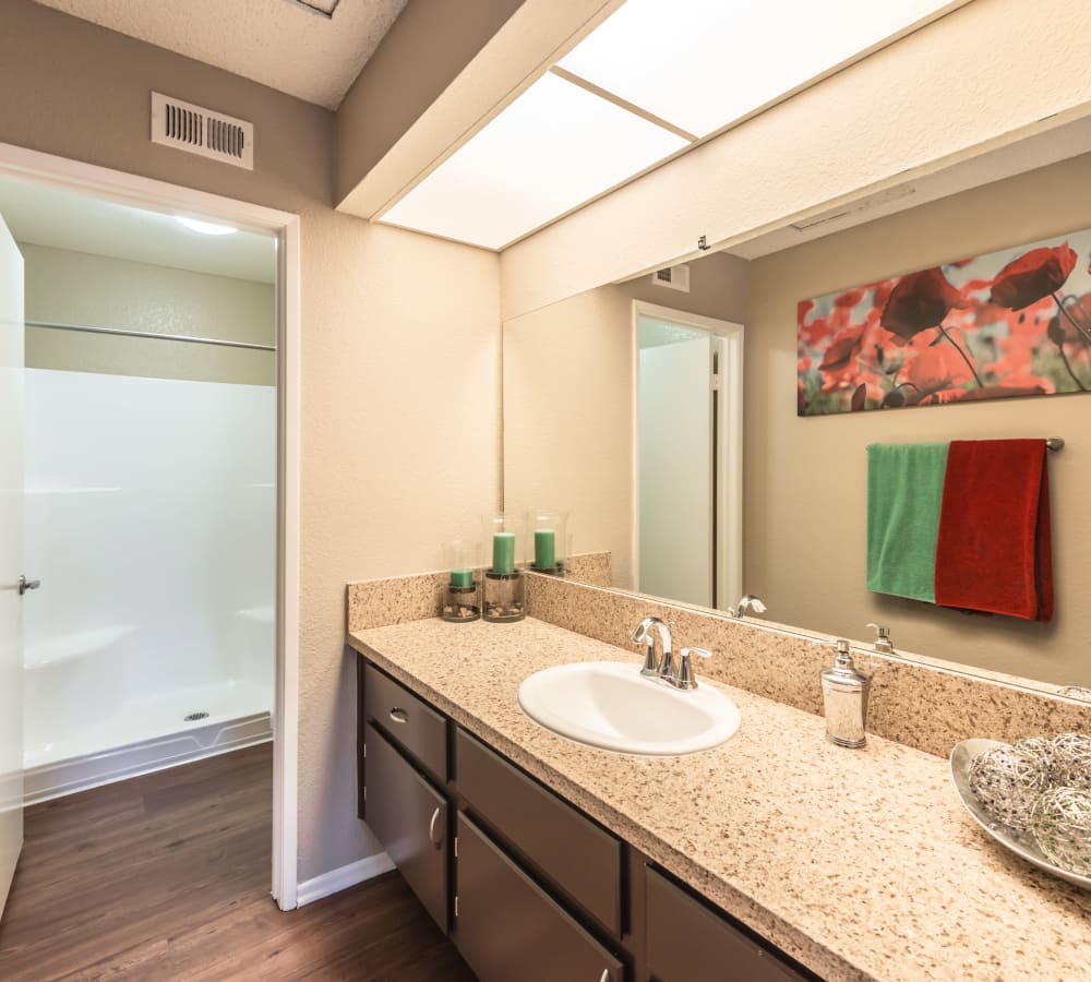 Main upgraded bathroom with a large vanity at Sonora at Alta Loma in Alta Loma, California