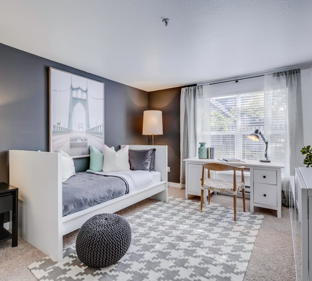 Plush carpeting in the spare bedroom of a standard model home at Centro Apartment Homes in Hillsboro, Oregon