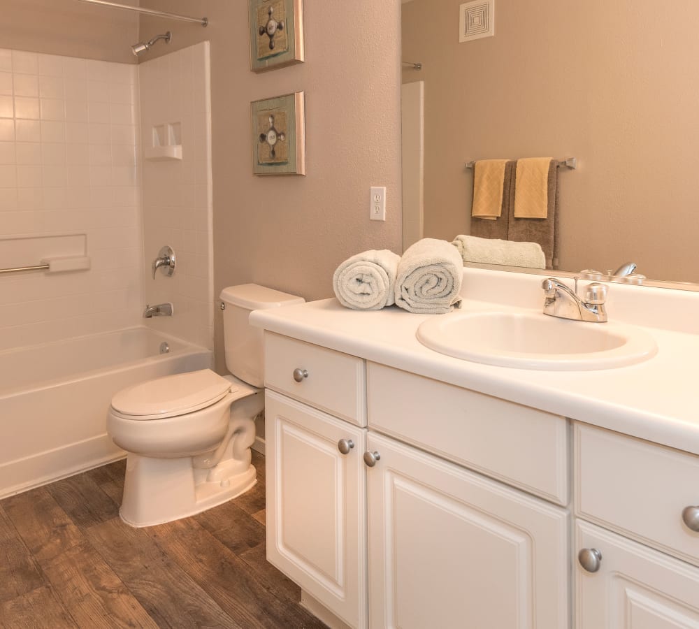 Large bathroom with plenty of cabinet space at Cross Pointe Apartment Homes in Antioch, California