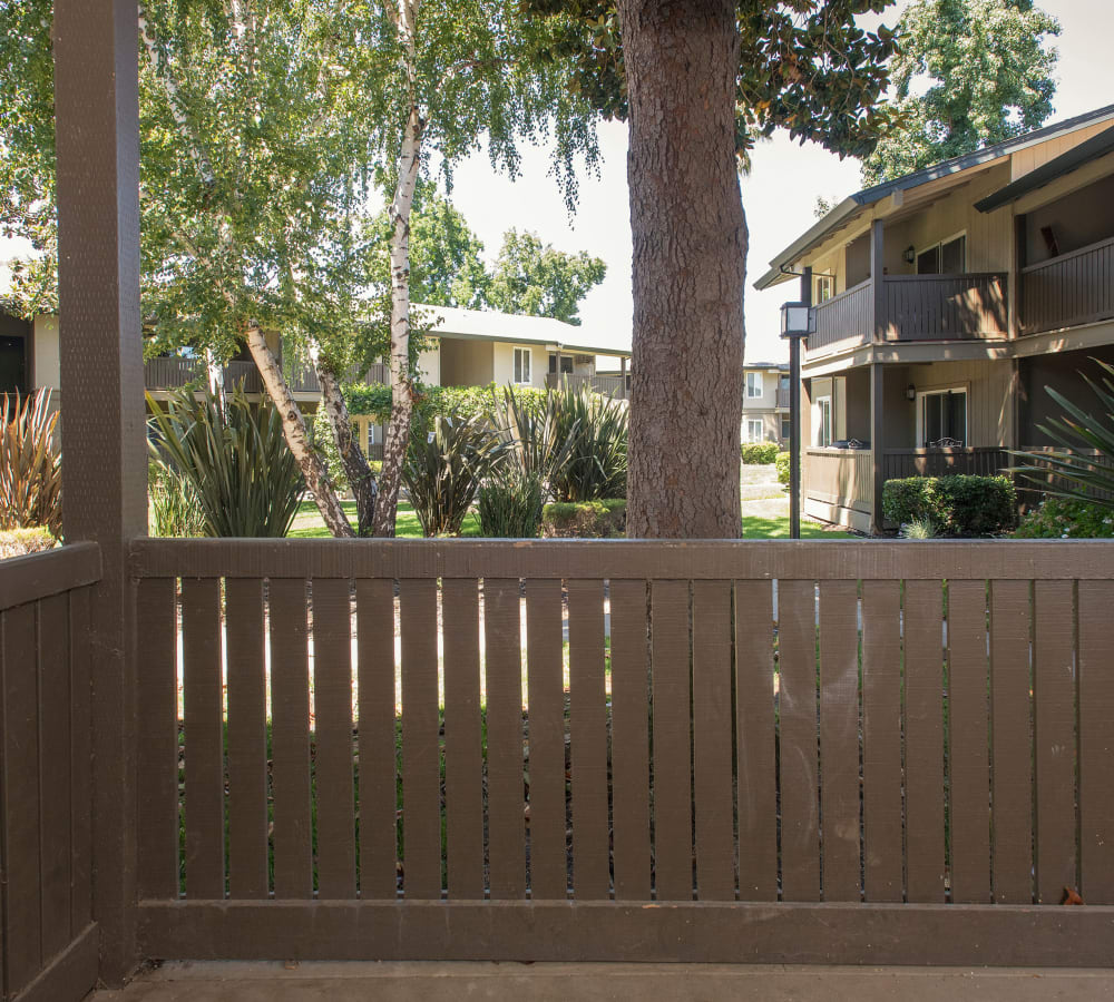 A view out on the community from a private patio at Villa Palms Apartment Homes in Livermore, California