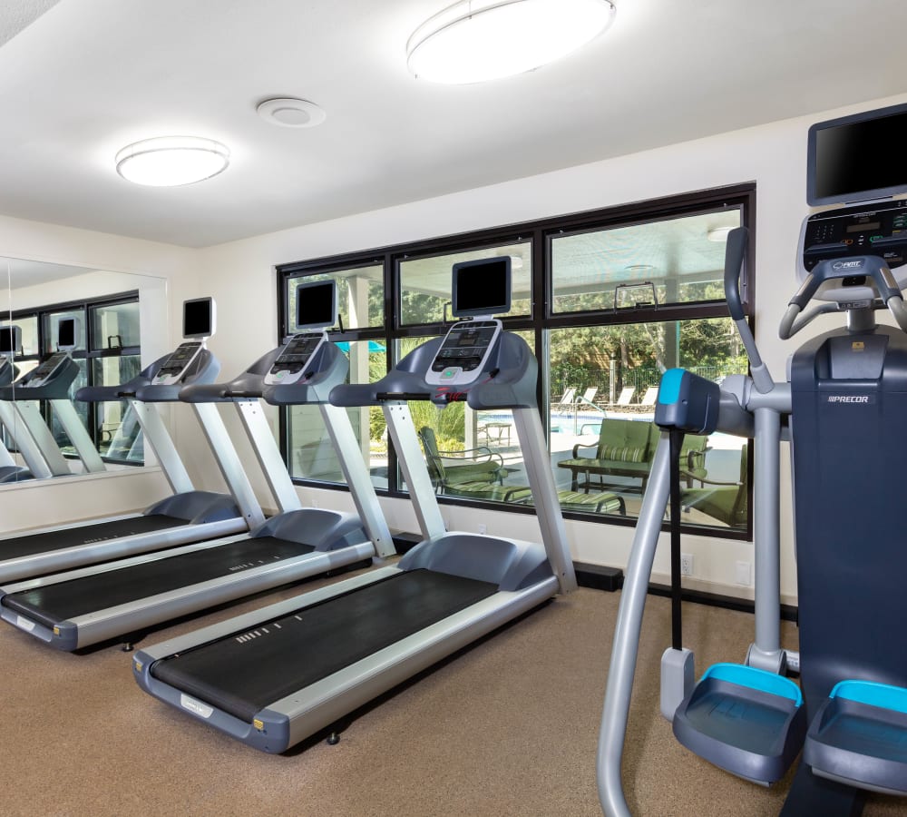 Well-equipped onsite fitness center at Madison Sammamish Apartments in Sammamish, Washington